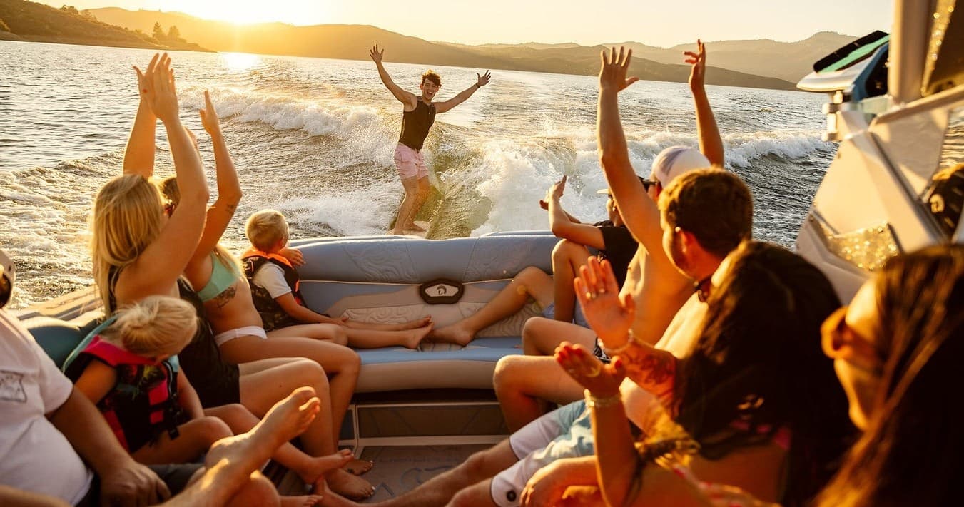 Sunset boat party with friends on a recreational lake cruise