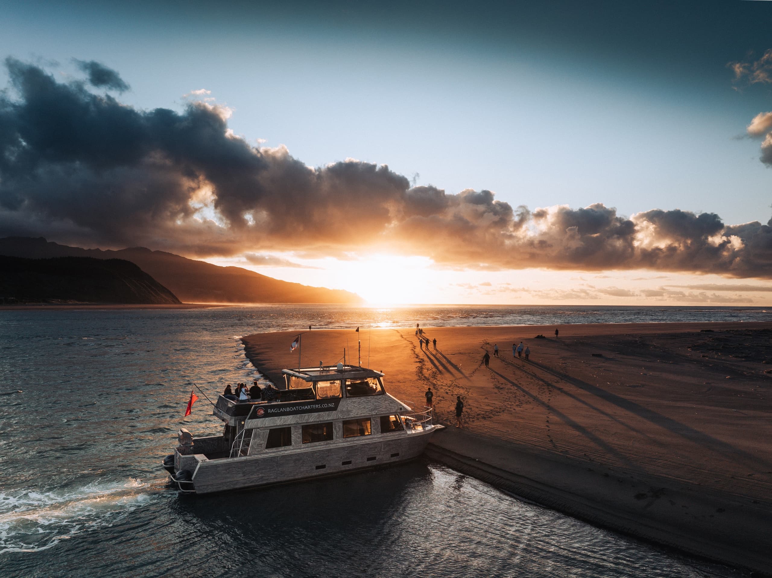 Water Activities & Raglan Boat Charters: Sunset Cruise Adventure