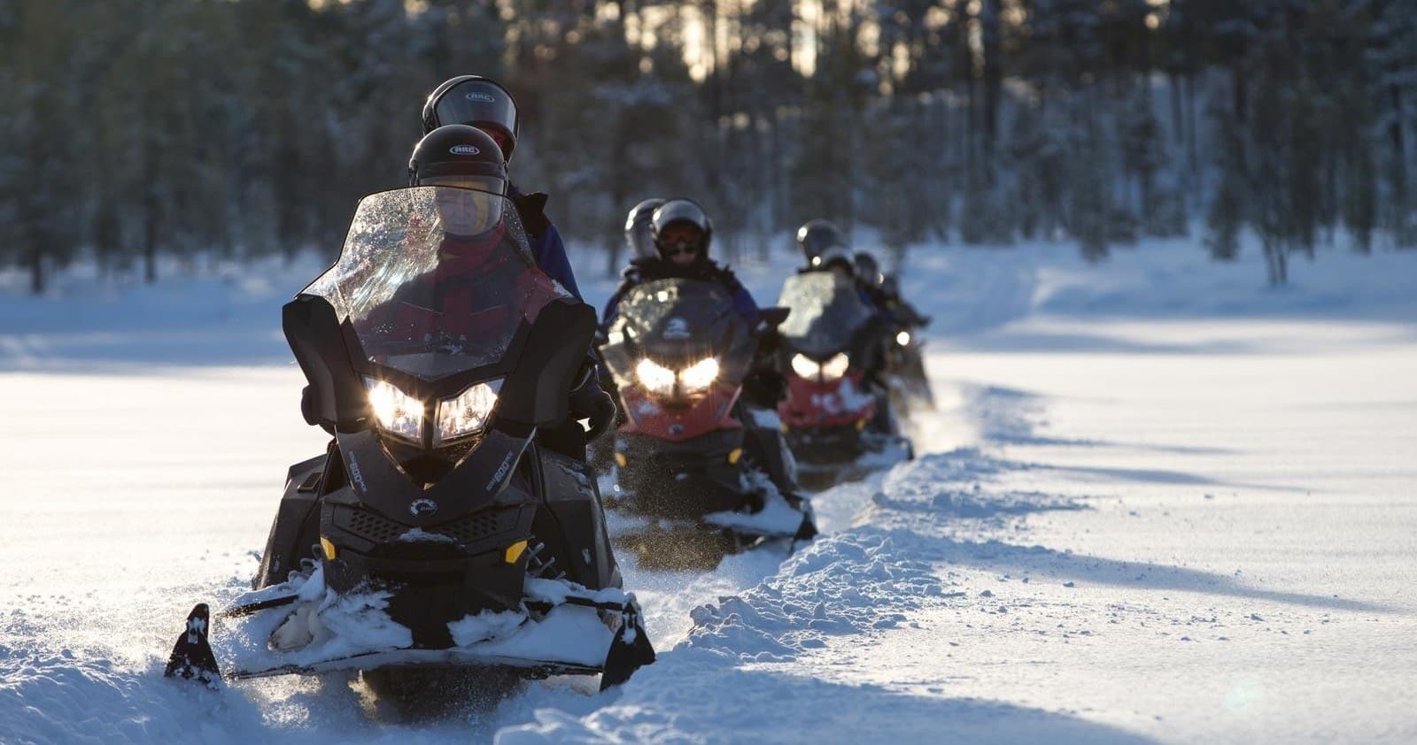 Winter Water & Snowmobile Tour at Northern Lights Village Saariselkä