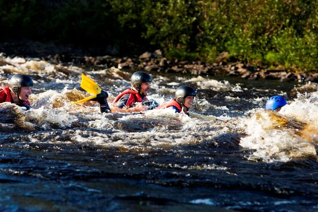 Spin and Splash: Tire Rafting Lapland Rapids Near Kittilä