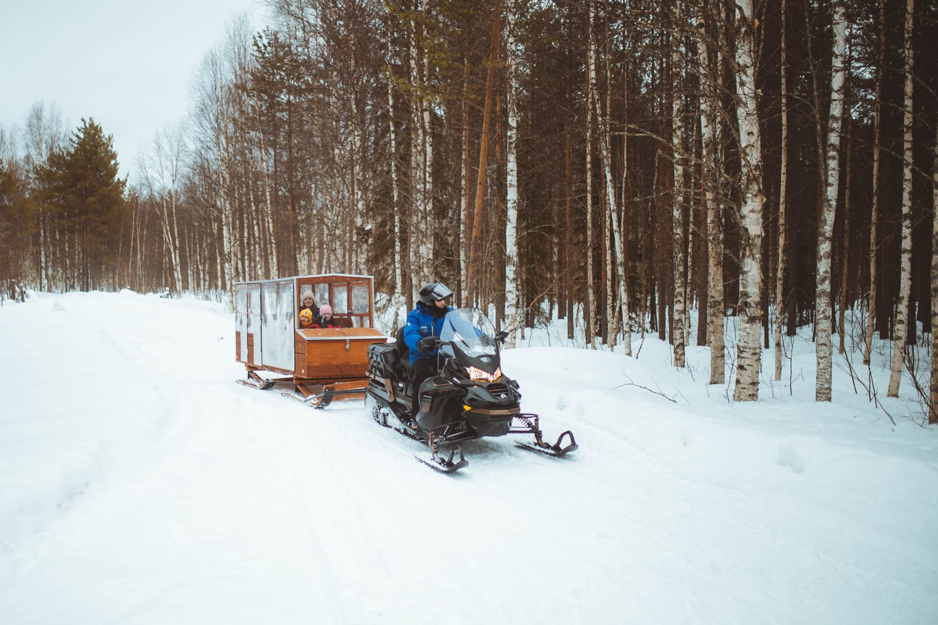 Family Snowmobiling Adventures with Apukka Resort in Rovaniemi