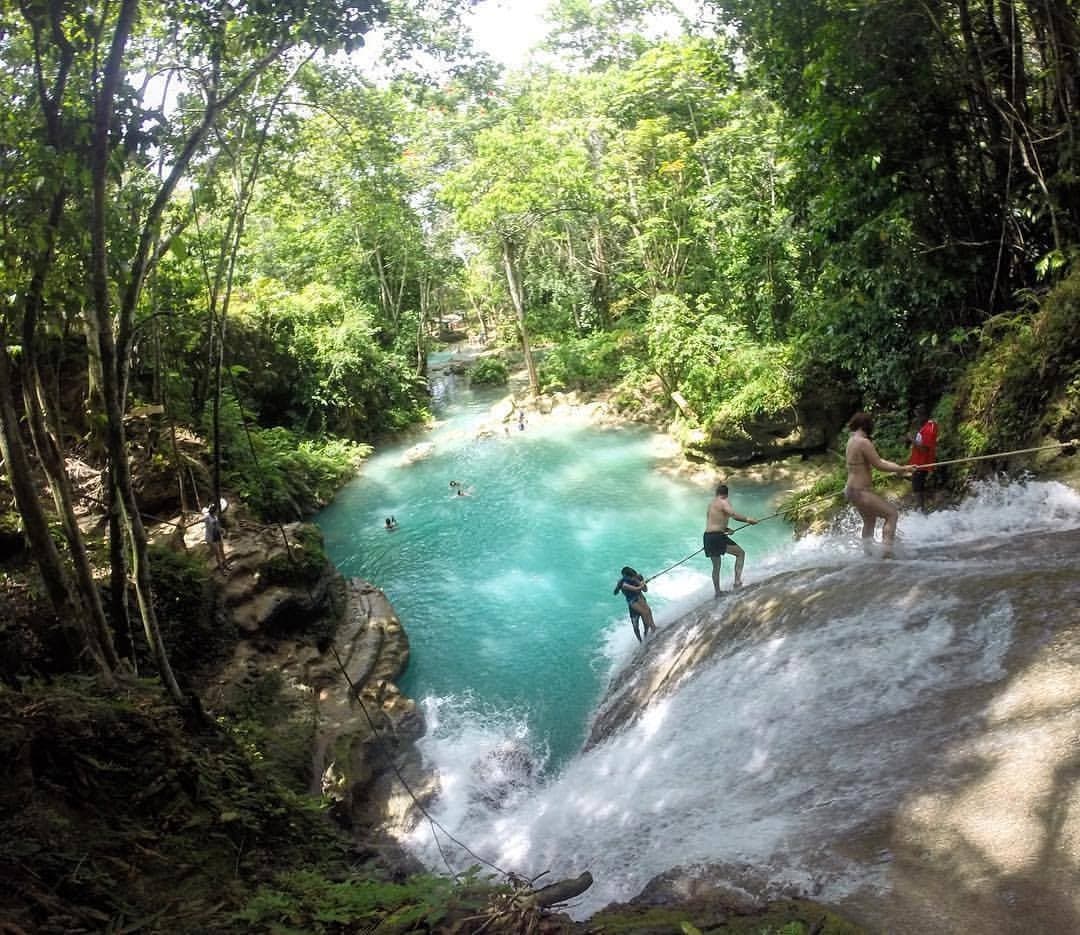 Explore Jamaica's Blue Hole: River Tubing and Bamboo Rafting Adventure in Ocho Rios