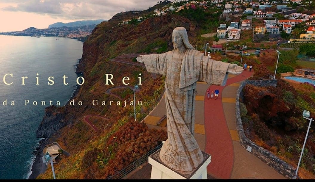 Cristo Rei statue overlooking Madeira coastline, scenic viewpoint