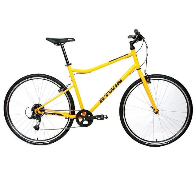 Yellow hybrid bike for scenic road cycling, studio white background