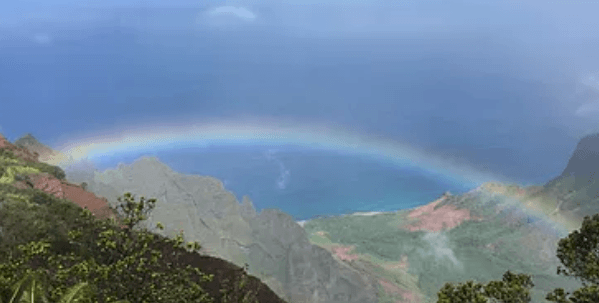 Rainbow over Waimea Canyon panoramic lookout in Kauai