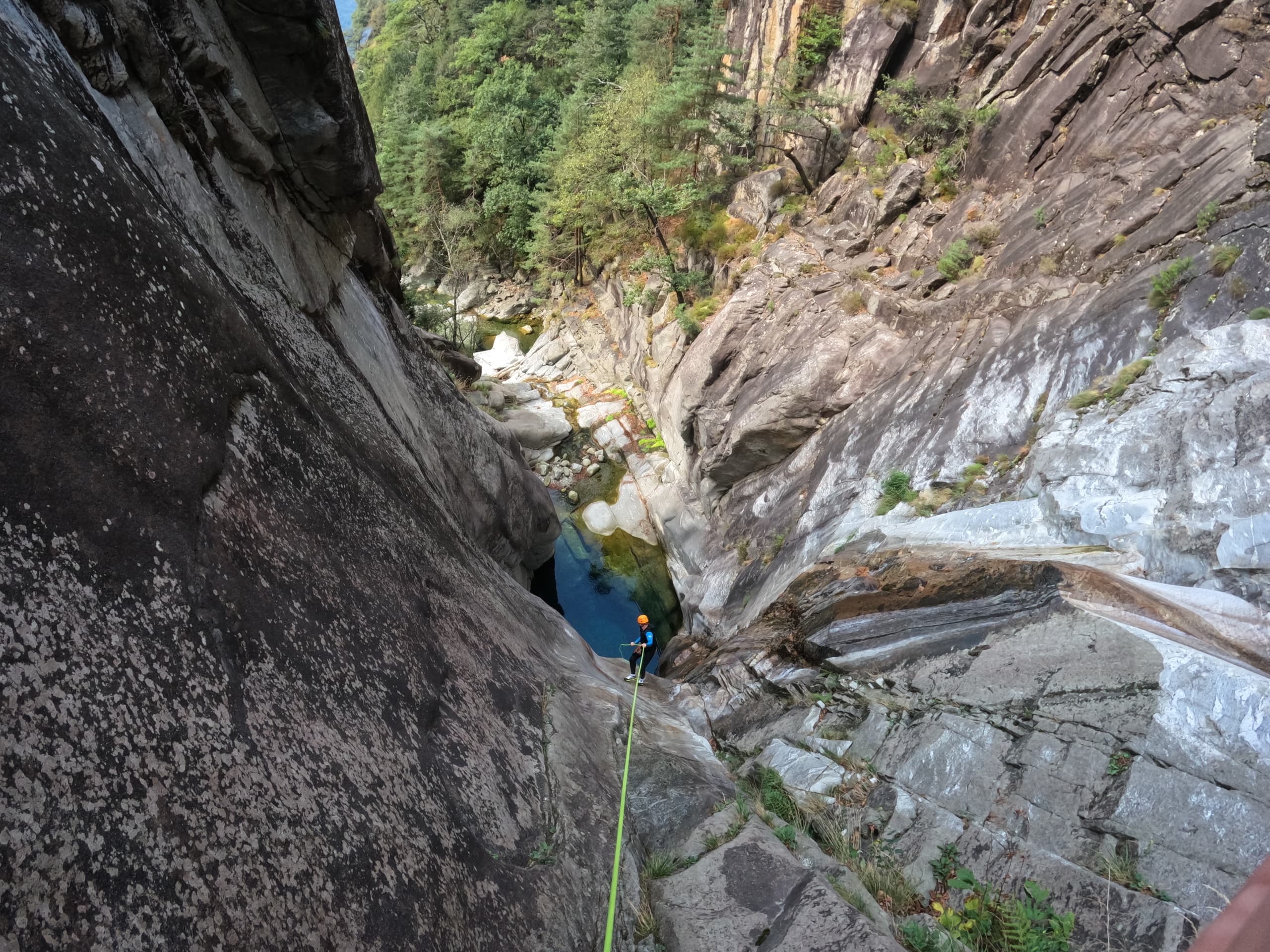Panoramic canyon view with clear river and steep cliffs