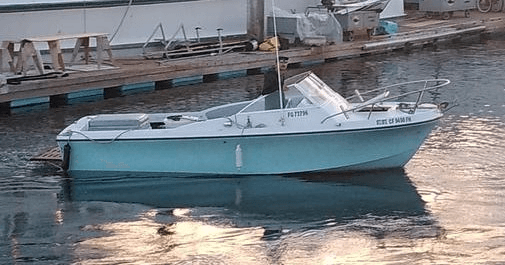 Small angler boat moored at marina in San Diego harbor