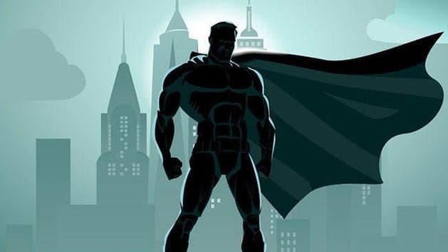 Silhouette superhero against city skyline, urban adventure motif