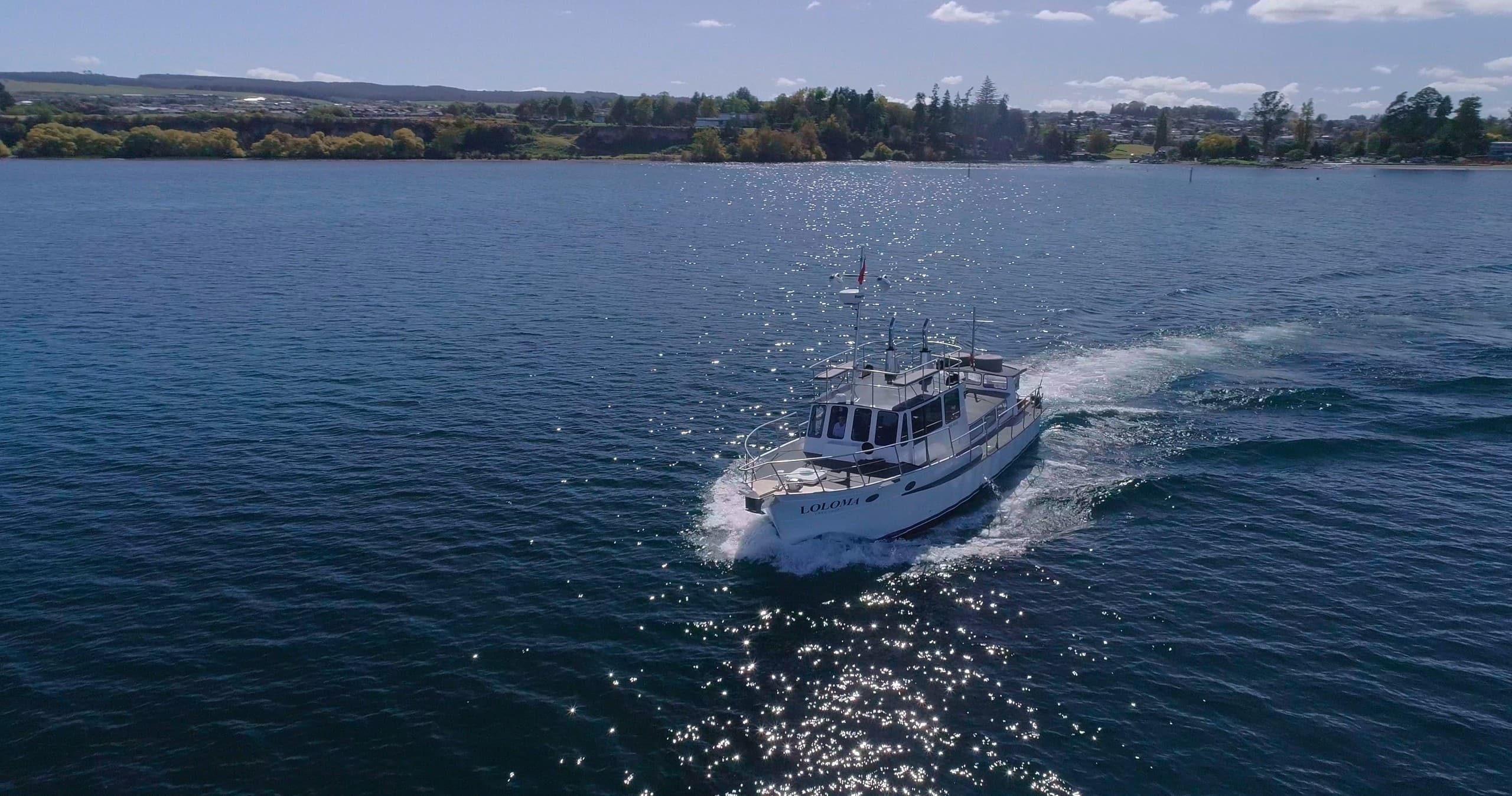 Three-Hour Loloma Charter: Māori Rock Carvings, Fishing & Events on Lake Taupō