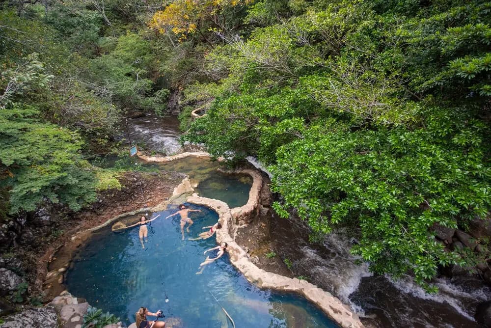 One Day, Four Adventures at Hacienda Guachipelin: Zip, Rappel, Tube & Soak