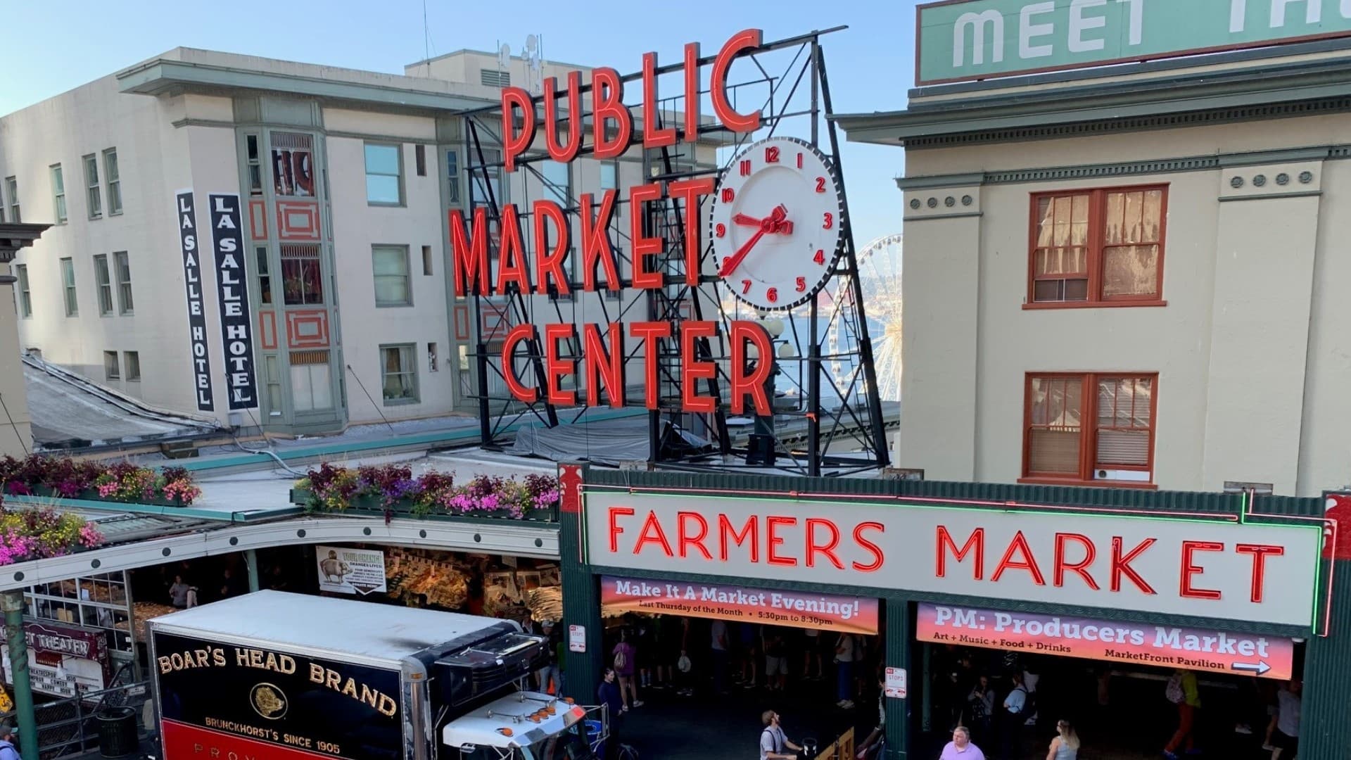 Pike Place Market facade and Farmers Market sign in Seattle