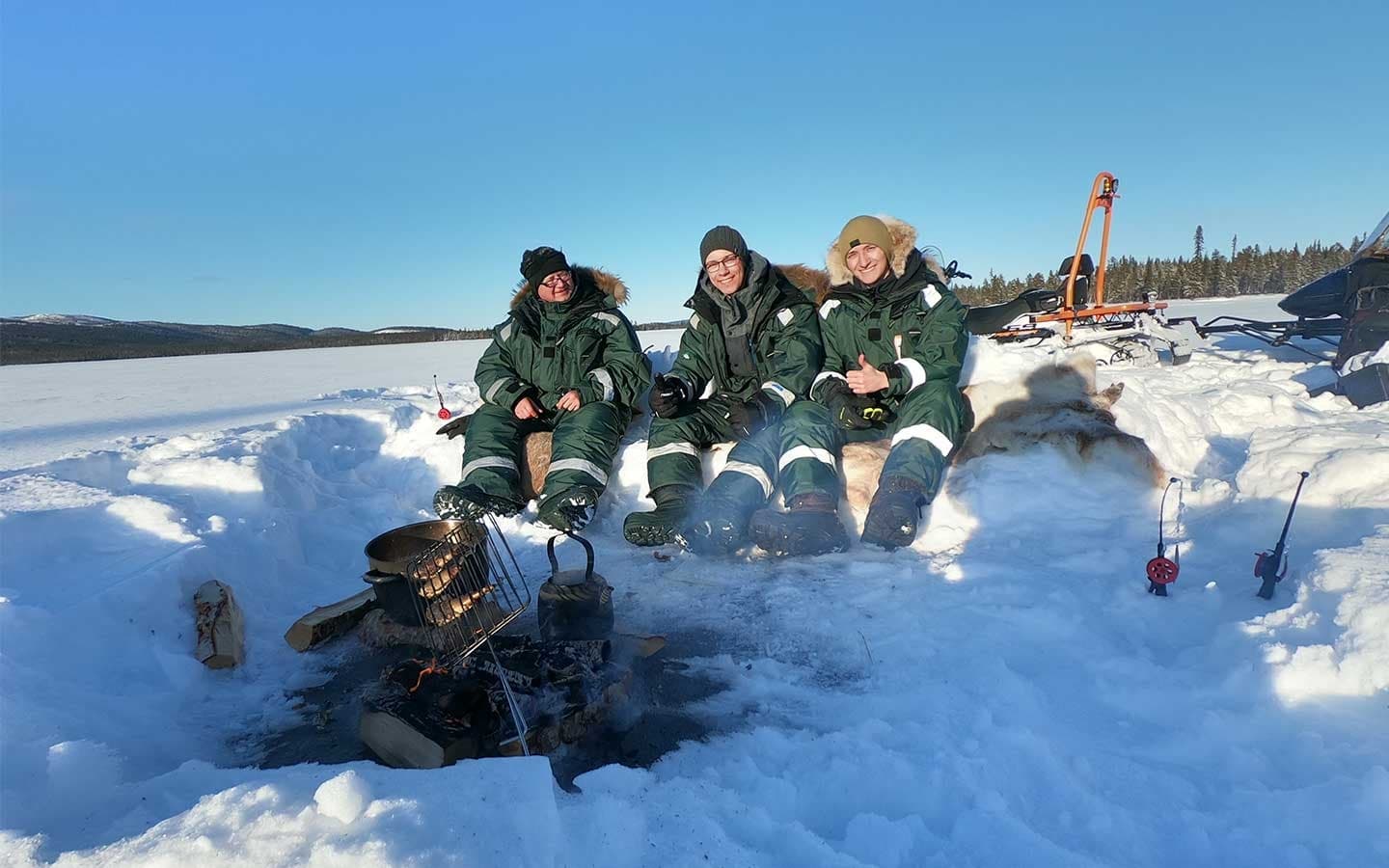 5.5 hours Group Snowmobile Tour with Ice Fishing