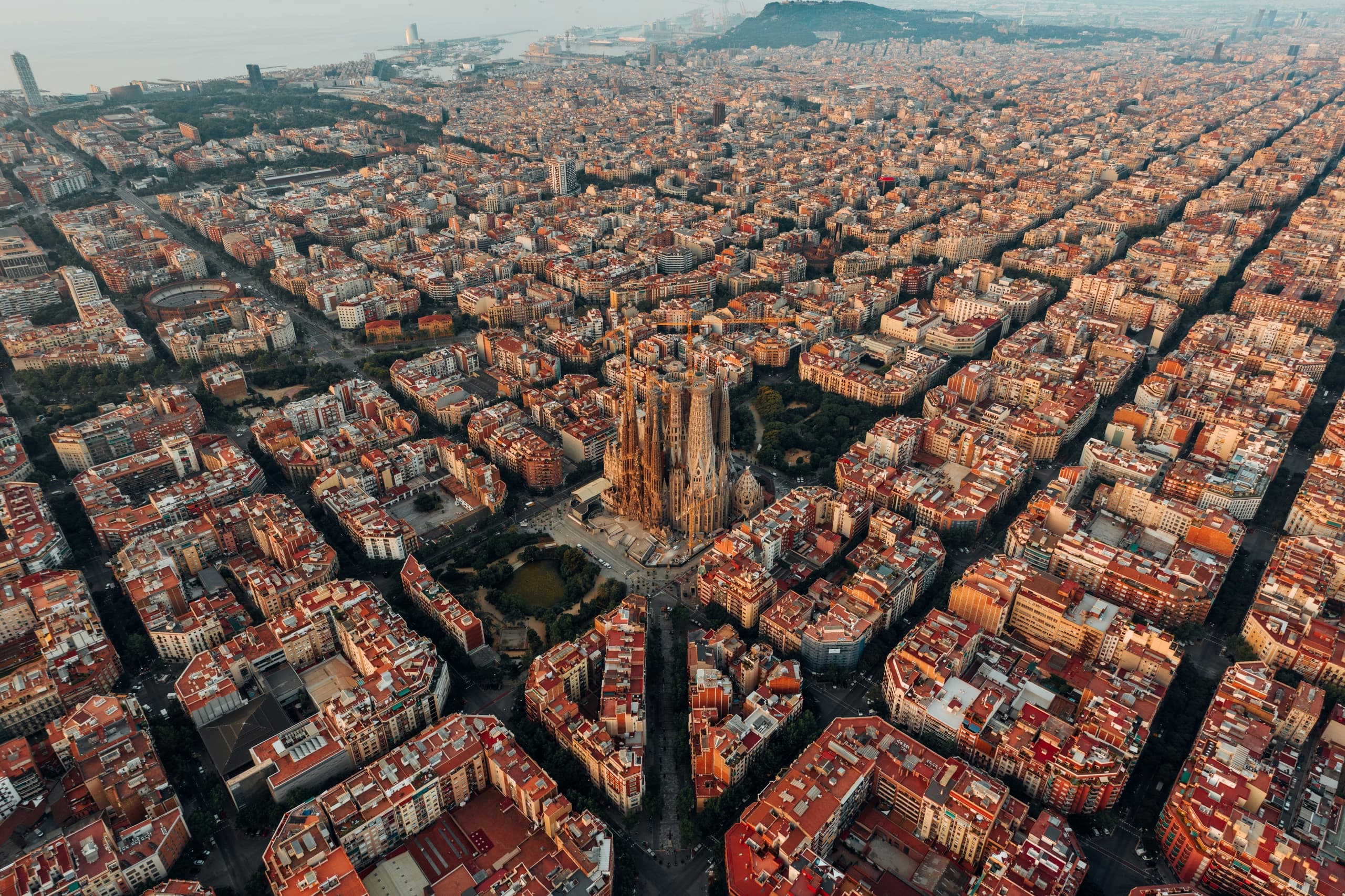 Aerial cityscape of Barcelona Eixample grid and skyline