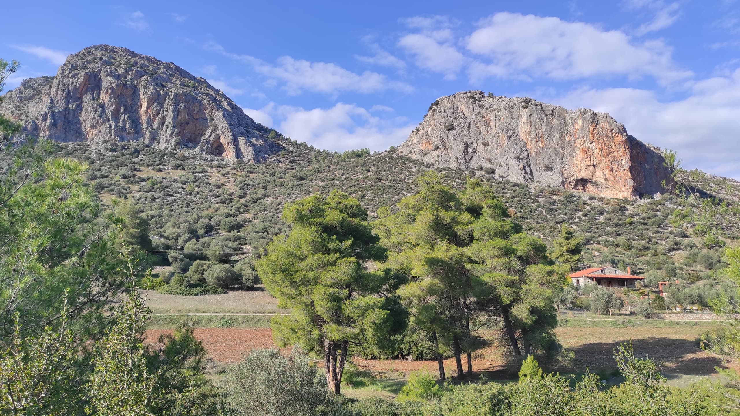Dramatic limestone cliffs and coastal hills landscape panorama