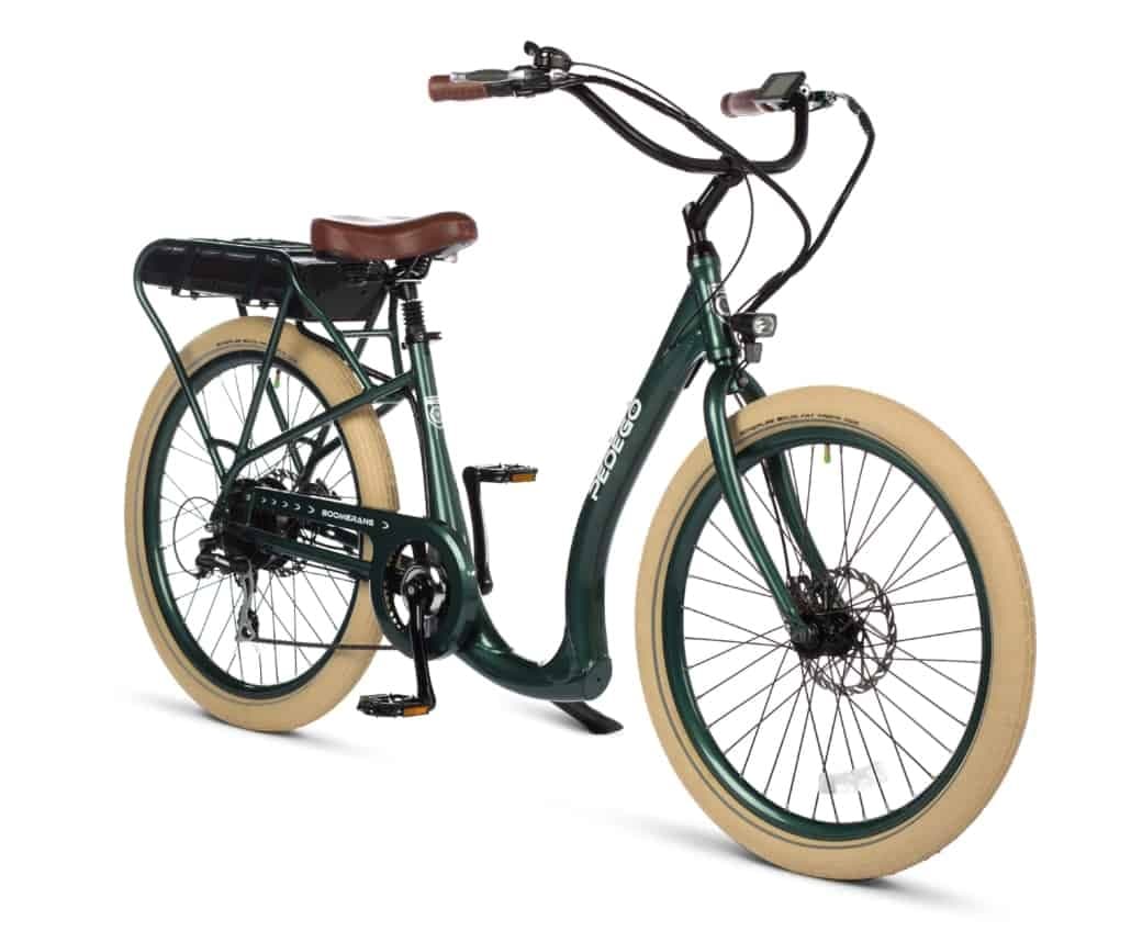 Green cruiser electric bike studio shot, retro tires and saddle