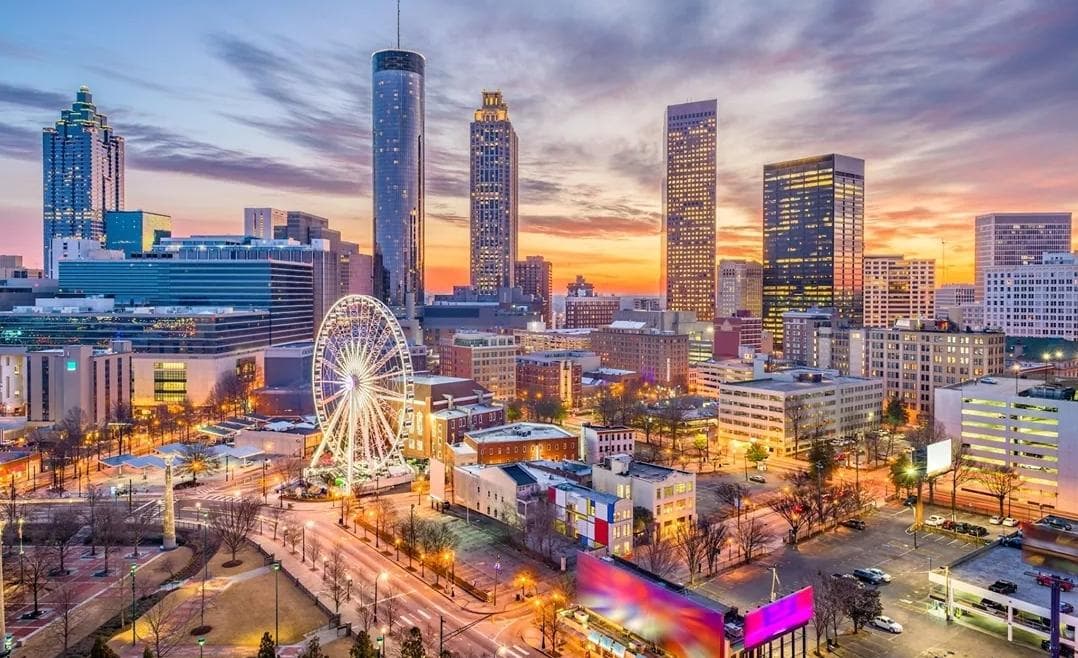 Atlanta skyline with Ferris Wheel at sunset, urban sightseeing tour