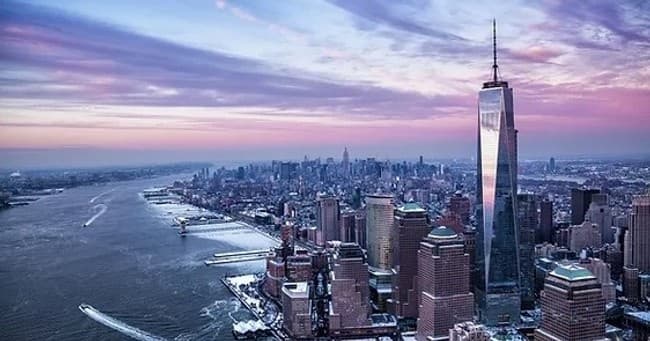 Aerial skyline of Manhattan with One World Trade Center waterfront