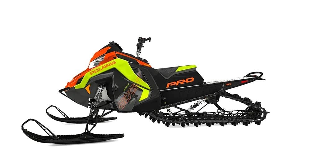 Orange Polaris snowmobile rental studio shot for backcountry