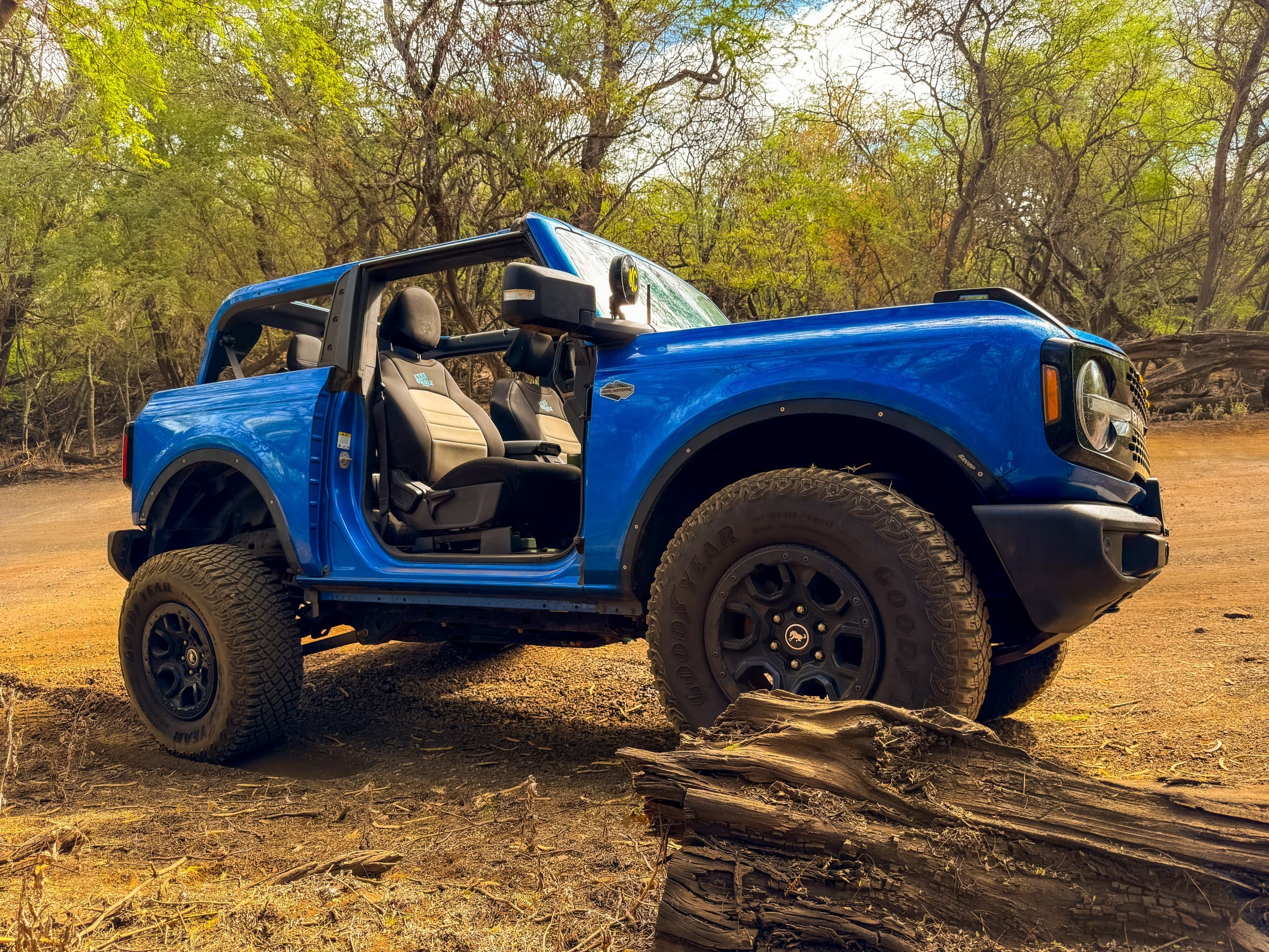 Off-road Jeep parked in rugged tropical forest ready for overland