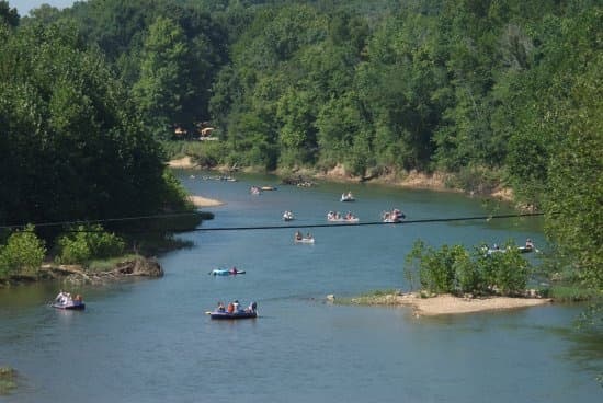 Scenic river bend at Meramec Park with canoeing activity