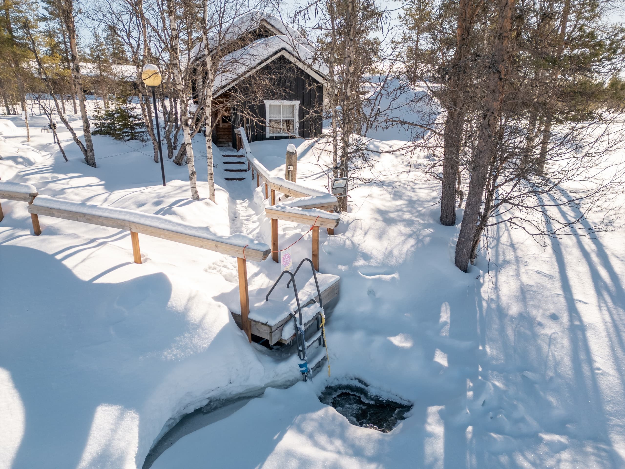 Winter River Sauna & Ice-Swimming at Wilderness Hotel - Muotka