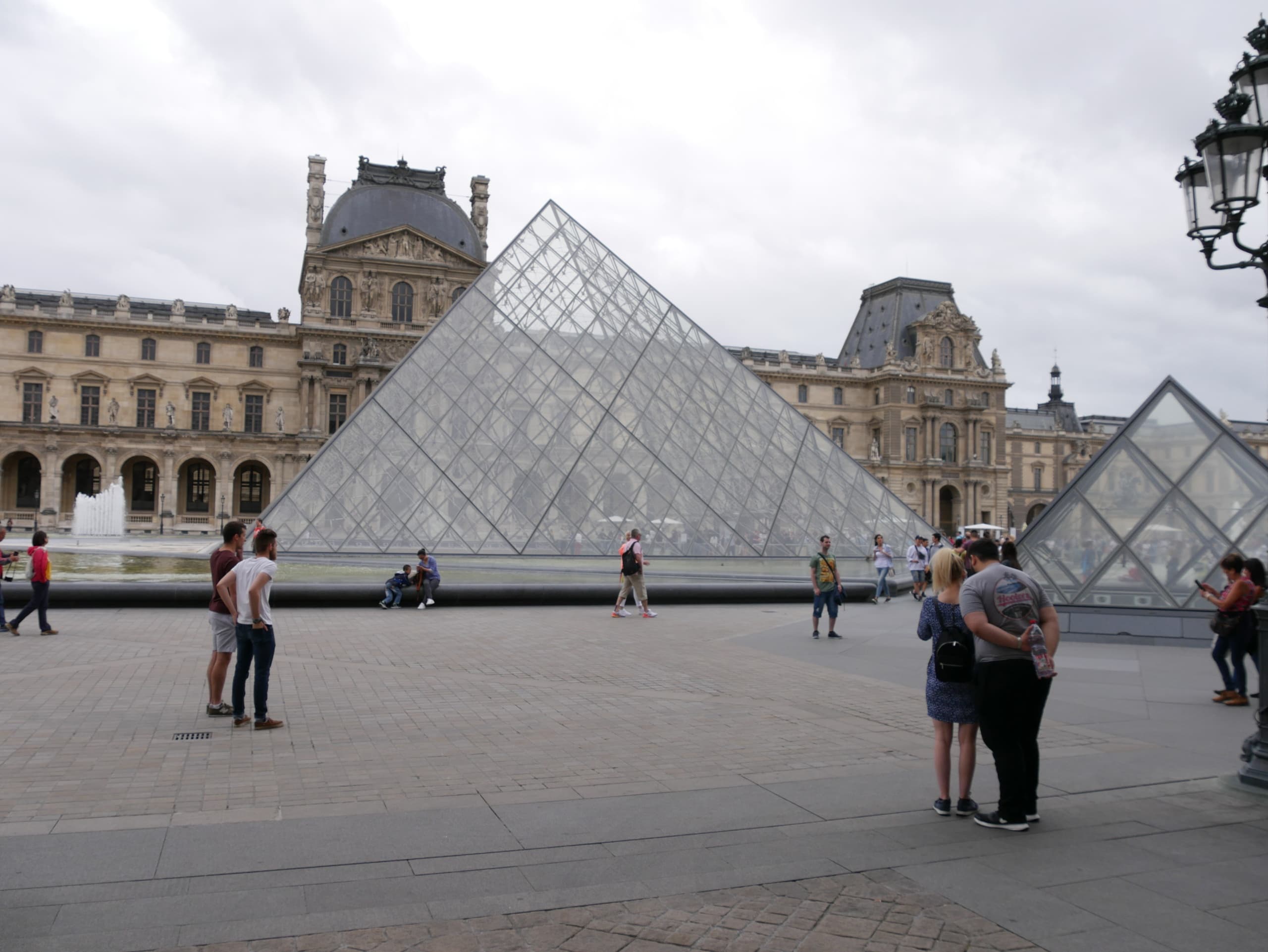 Louvre Outdoor Walking Tour: Courtyards, Pyramid & Quiet Photography Walk photo 4