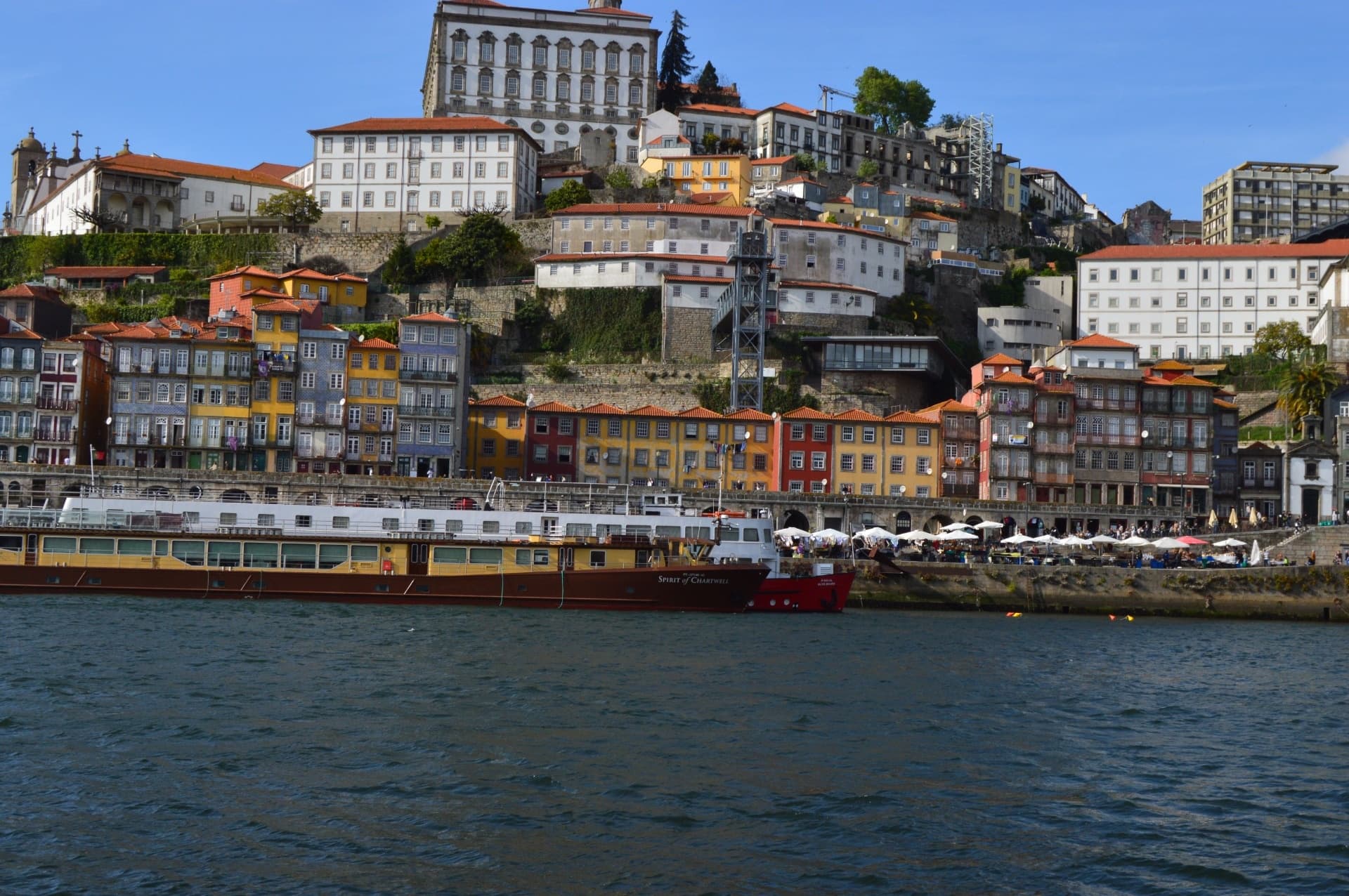 Riverside cityscape with colorful buildings facing the water