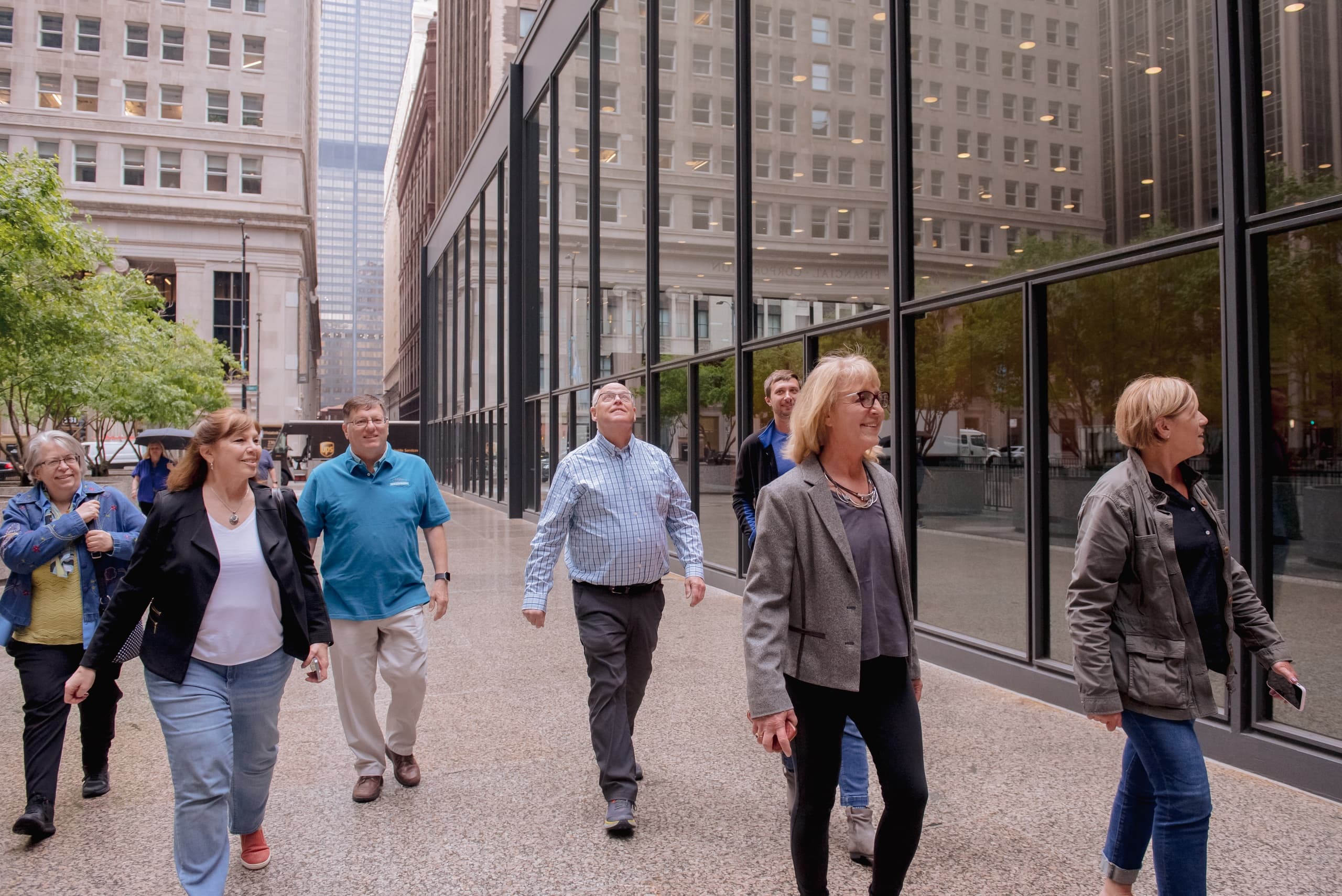 Guided Chicago food walking tour group on downtown street exploration