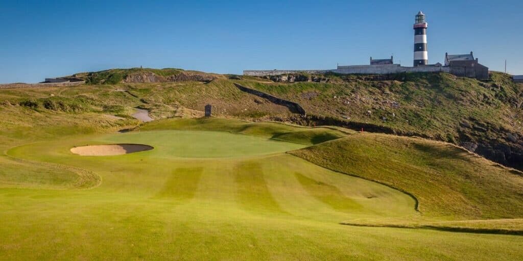 Seaside golf course with lighthouse and fairways for coastal play
