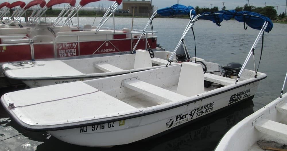 Explore Wildwood Waters with a 17' Carolina Skiff
