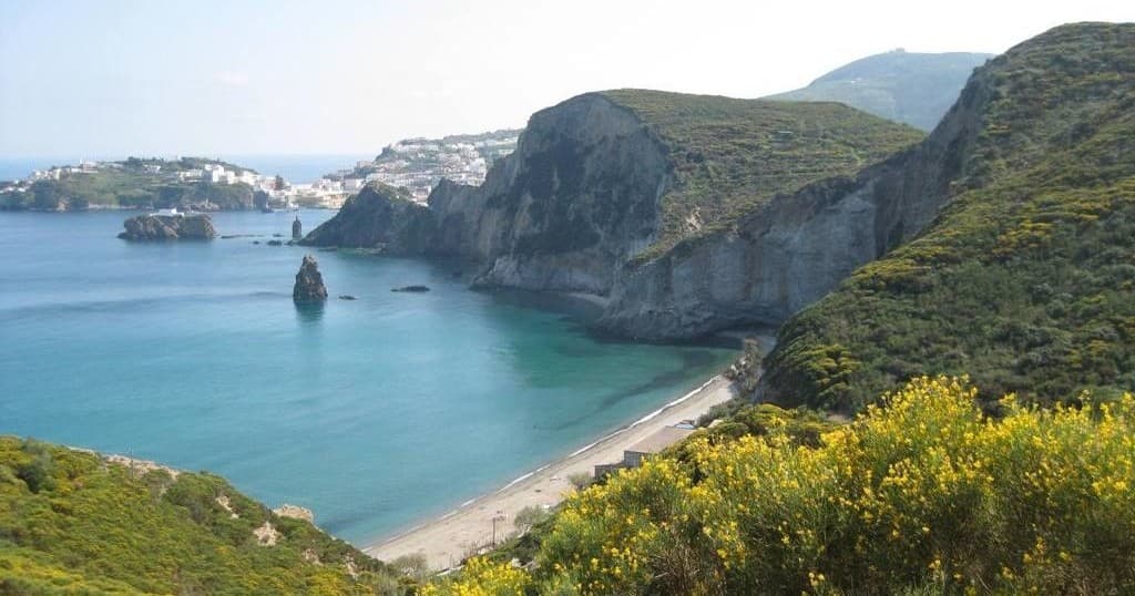 Panoramic bay and cliffs with turquoise water at Ponza coast