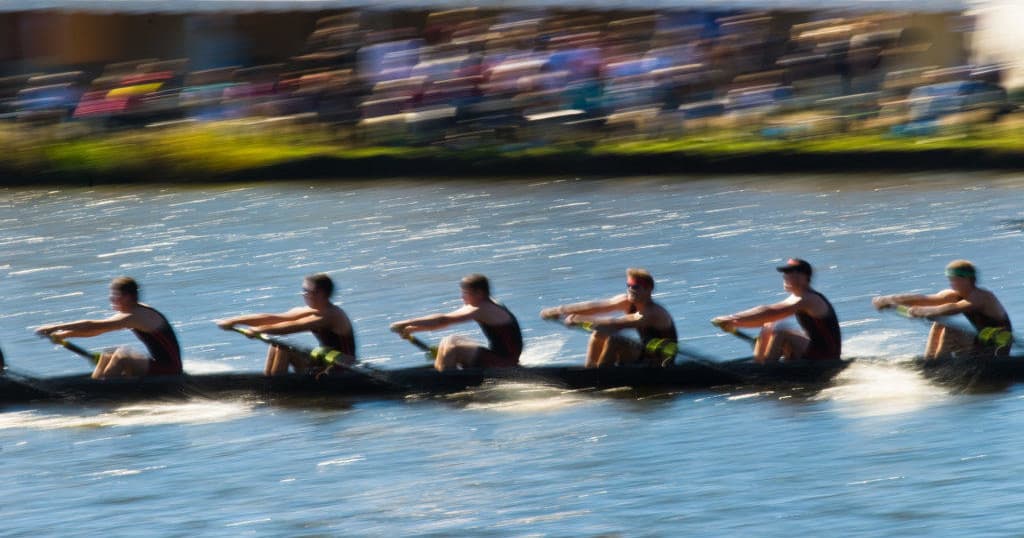 Competitive rowing crew racing on the River Thames in Henley