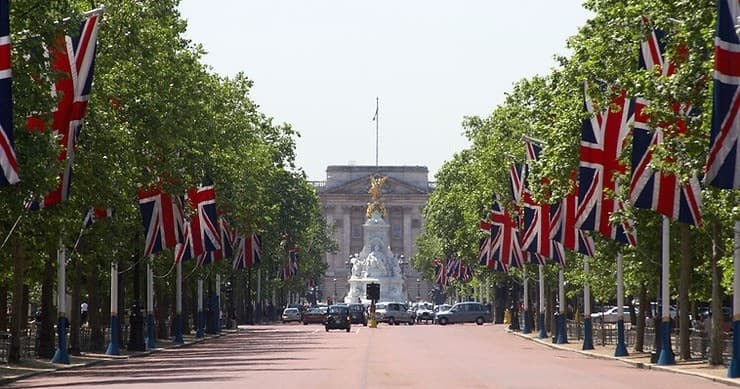 The Mall London lined with Union flags toward Buckingham Palace