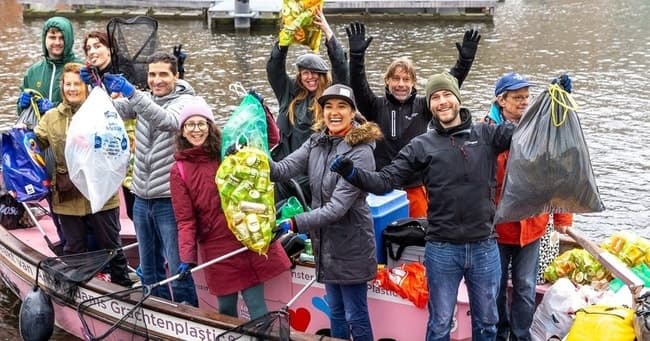 Plastic Fishing on Amsterdam’s Canals: Company Outings with Plastic Whale photo 1