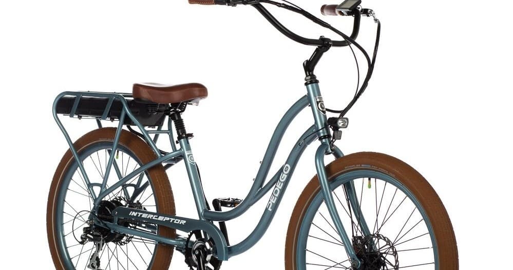 Blue electric cruiser bike studio product shot for urban rides