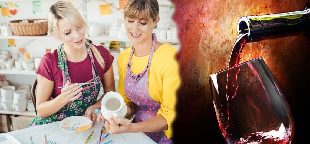 Adults painting ceramics in pottery studio during class session