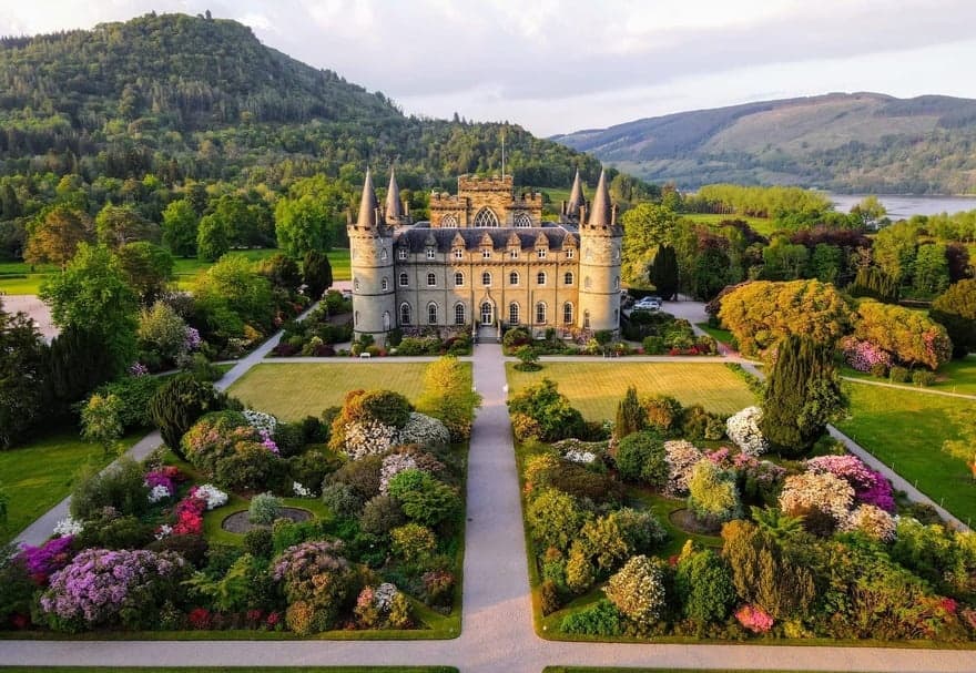 Formal castle gardens with manicured paths in Scotland