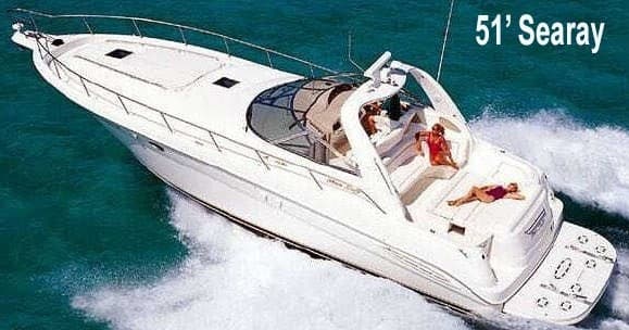 Luxury yacht cruising turquoise waters off Chicago lakefront