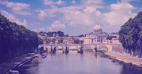 Panoramic view of the Tiber River and Rome skyline, riverside walk