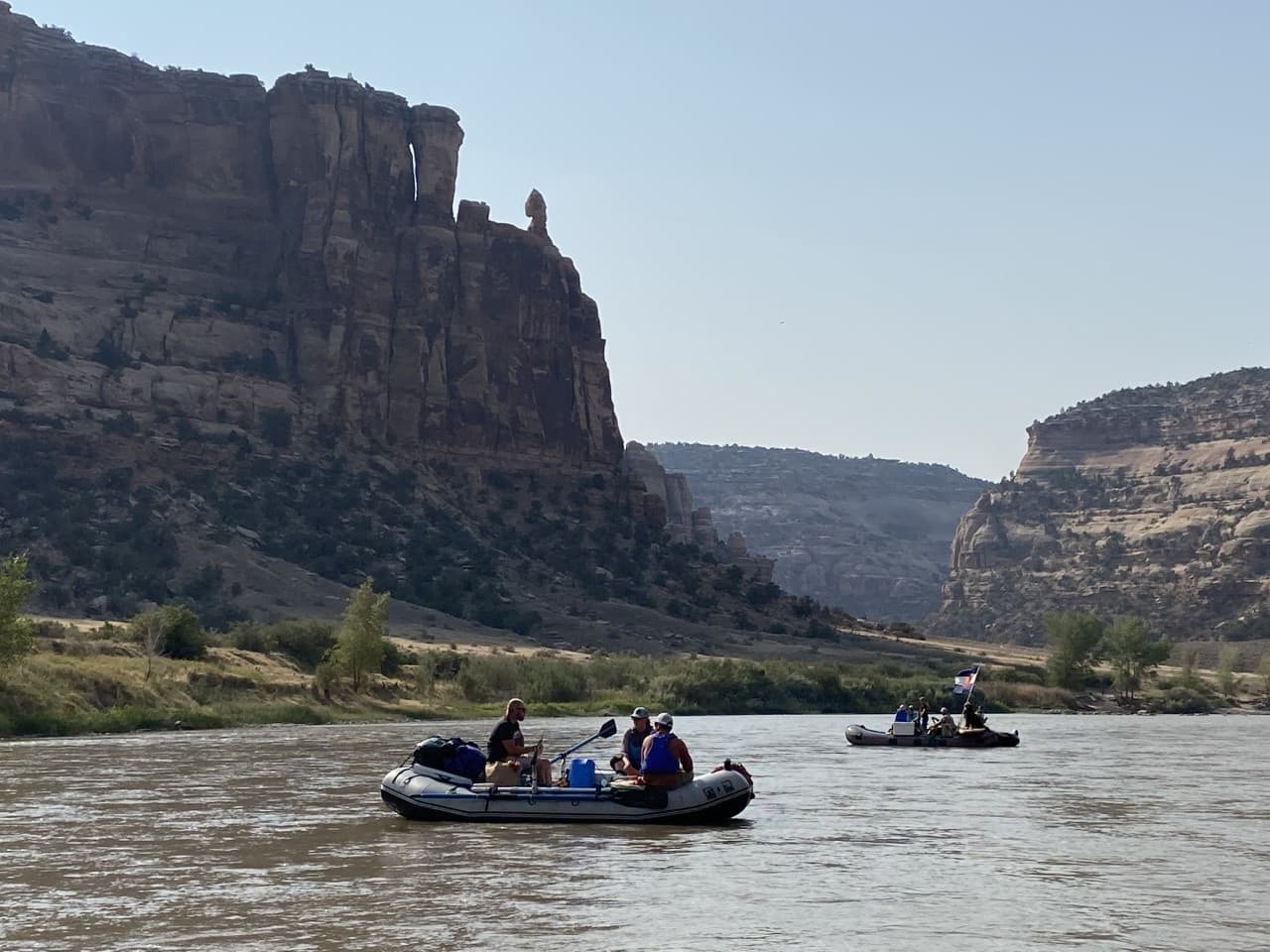 River rafting through canyon scenery with guide-led rafts