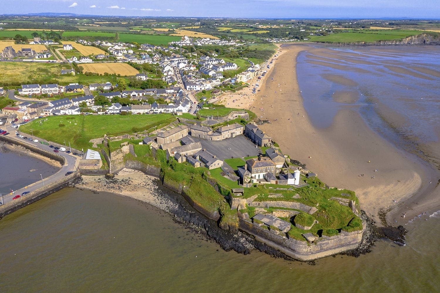 Aerial coastal view of Duncannon Fort and sandy beach, coastal exploration