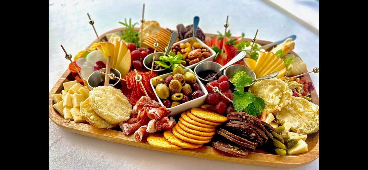 Charcuterie platter served on yacht deck for gourmet grazing