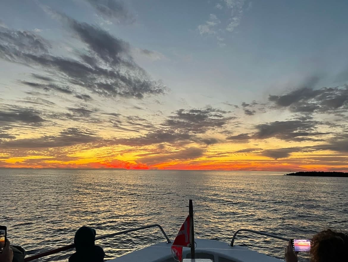 Boat bow at sunset off Panama City Beach, offshore fishing