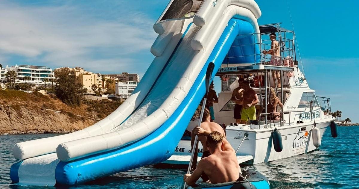 Private Mediterranean Boat Adventure from Torremolinos: Snorkel Wrecks, Dolphins & XXL Slide