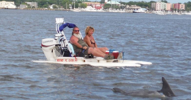 Couple on backwater boat with dolphin sighting near Marco Island