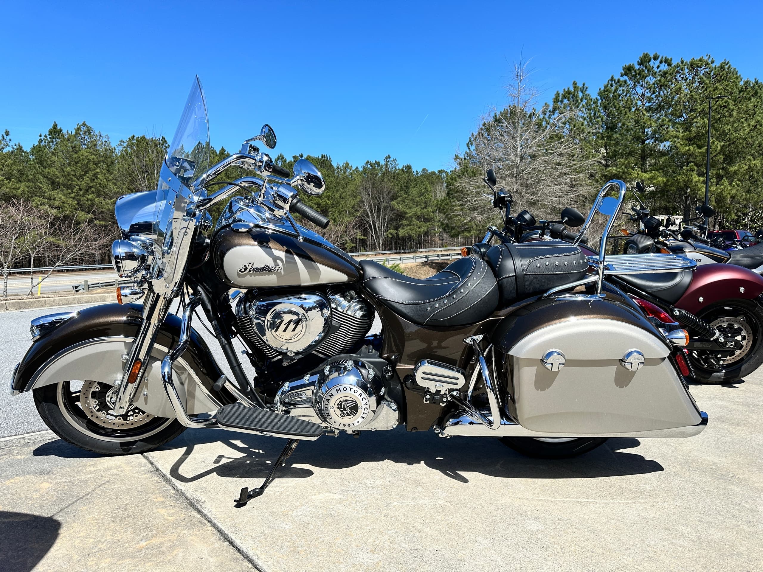 Classic Indian touring motorcycle parked outdoors at Mall of Georgia