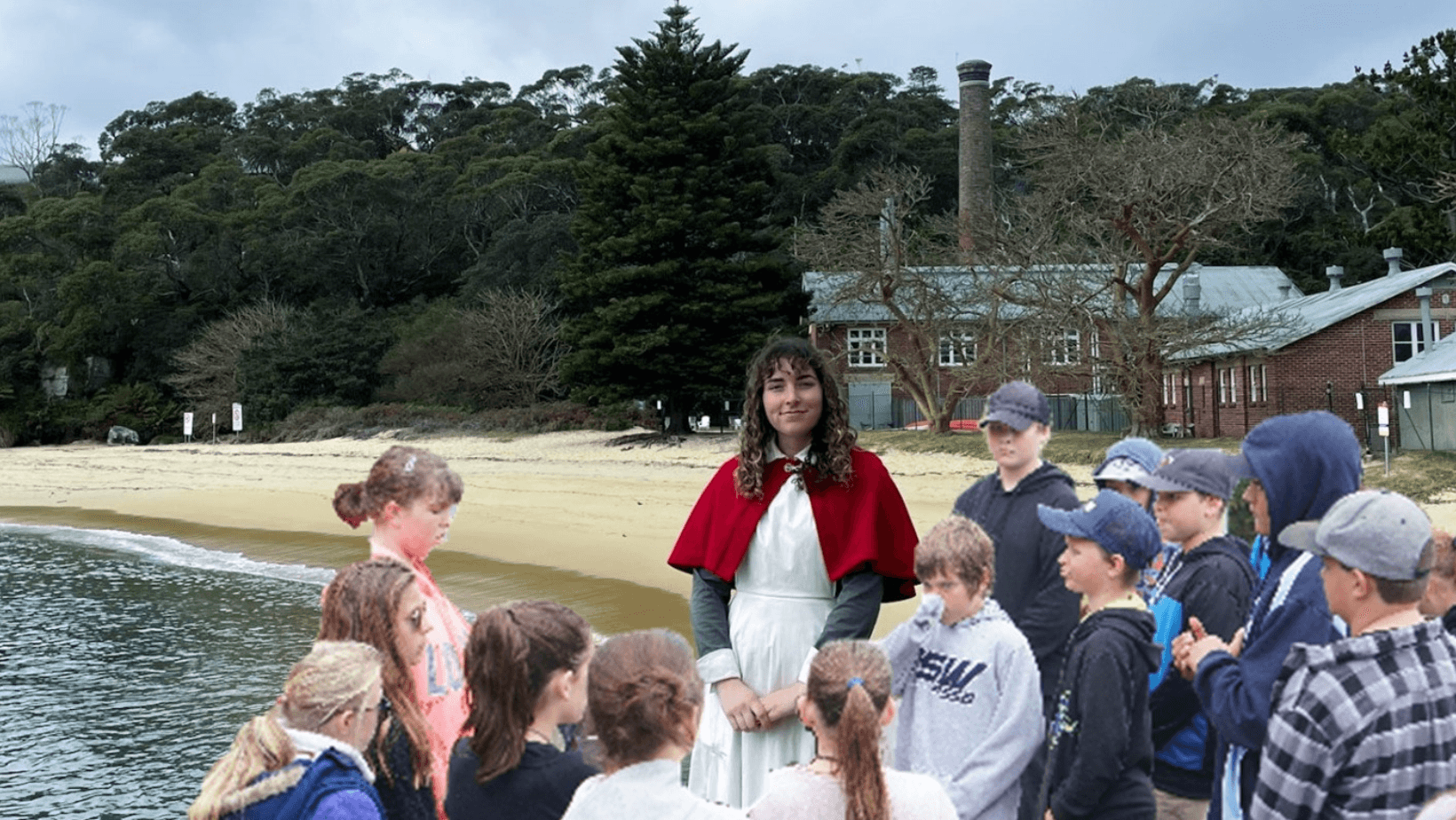 Guided shore tour with children at historic headland beach
