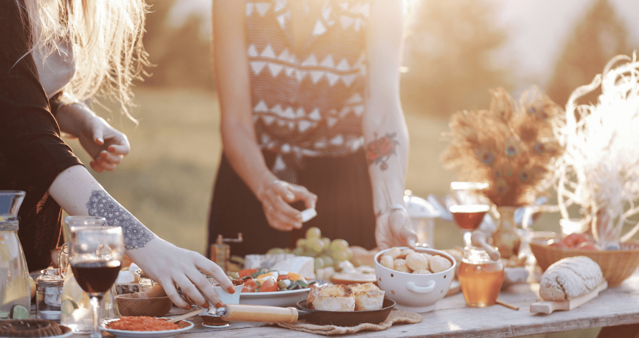 Sunlit outdoor picnic with friends sharing tapas in Lisbon