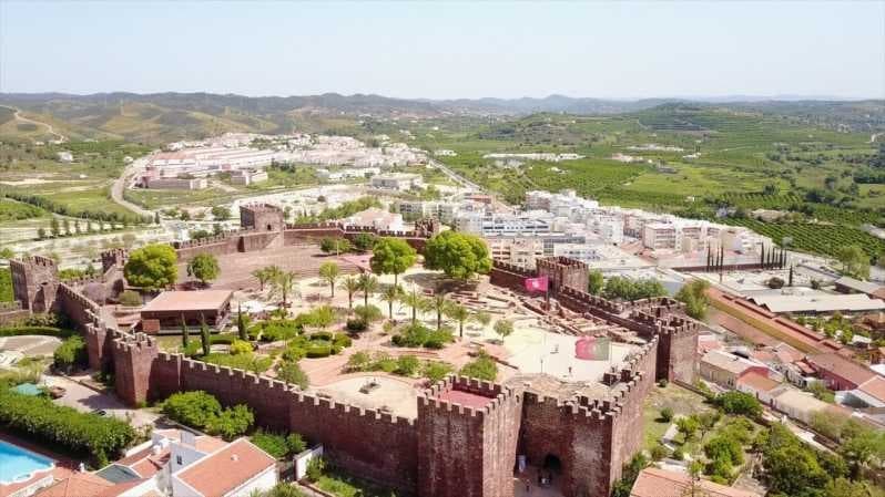 Aerial view of medieval castle and town, panoramic sightseeing