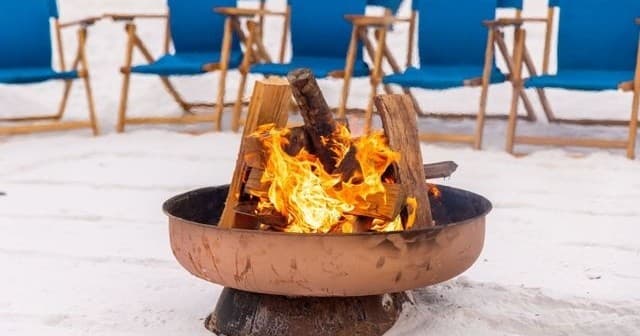 Beach bonfire and seating set on Destin white sand
